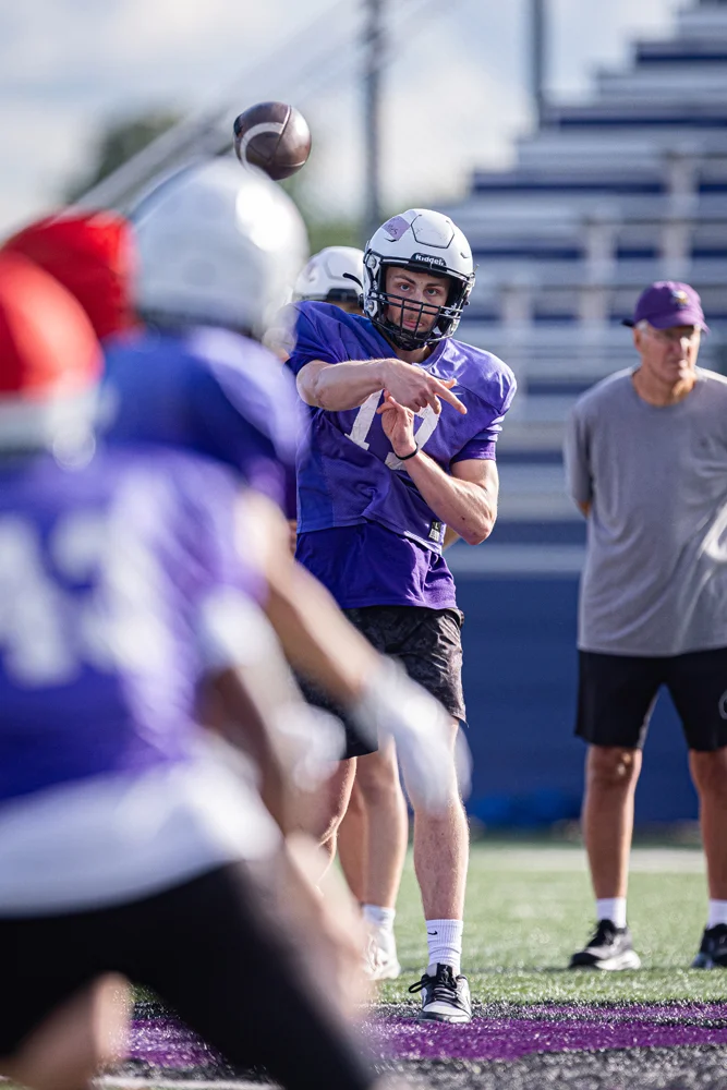 Bison QB throwing down field