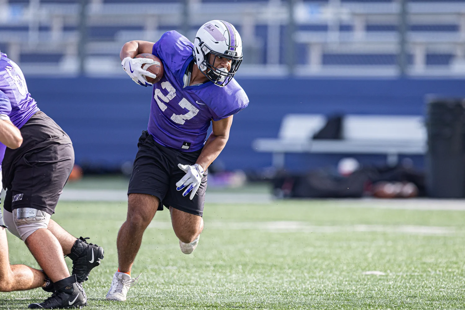 Bison RB running the ball down field